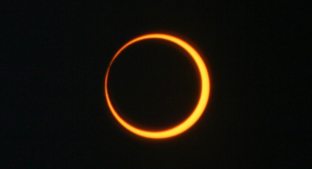 A solar eclipse showing bright orange.